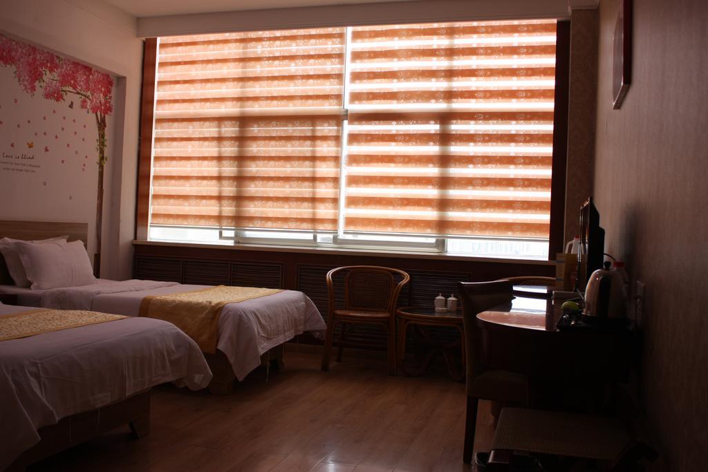 Qingdao Hongyun Jiahe Business Hotel Esterno foto